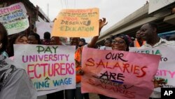 FILE - Nigeria Labour Congress members protest on the street in Lagos, Nigeria, July 26, 2022 in solidarity with the Academic Staff Union of Universities. On Oct. 14, 2022, the union said the strike, which began in February 2022, was suspended.