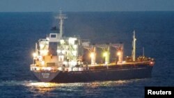 The Sierra Leone-flagged cargo ship Razoni, carrying Ukrainian grain, is seen in the Black Sea off Kilyos, near Istanbul, Turkey August 2, 2022.