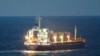 El carguero Razoni, con bandera de Sierra Leona, que transporta grano ucraniano, se ve en el Mar Negro frente a Kilyos, cerca de Estambul, Turquía, el 2 de agosto de 2022. REUTERS/Yoruk Isik
