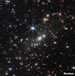 The first full-color image released by NASA from the James Webb Space Telescope shows the galaxy cluster SMACS 0723, in a composite made from images at different wavelengths taken with a Near-Infrared Camera and released July 11, 2022. ((Image Credit: NASA, ESA, CSA, STScI, Webb ERO Production Team/Handout via REUTERS)