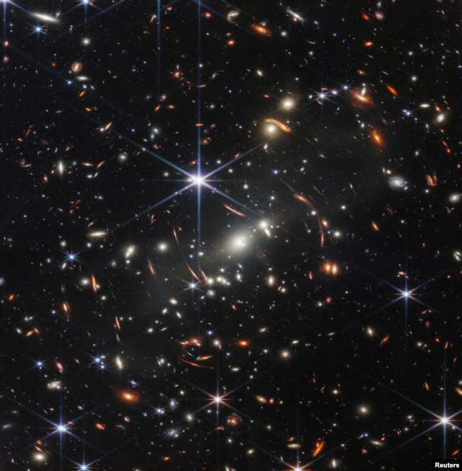 The first full-color image released by NASA from the James Webb Space Telescope shows the galaxy cluster SMACS 0723, in a composite made from images at different wavelengths taken with a Near-Infrared Camera and released July 11, 2022. (Image Credit: NAS