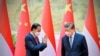 Presiden Indonesia Joko Widodo menyapa Presiden China Xi Jinping dalam pertemuan mereka di Beijing, China, 26 Juli 2022. (Laily Rachev/Istana Kepresidenan/Handout via REUTERS)