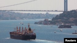 The Maltese-flagged bulk carrier 'Rojen', carrying Ukrainian grain, sails in the Bosphorus, Istanbul, Turkey, Aug. 7, 2022. 