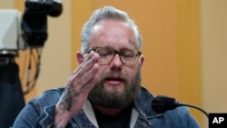 Jason Van Tatenhove, an ally of Oath Keepers leader Stewart Rhodes, testifies as the House select committee investigating the January 6 attack on the U.S. Capitol holds a hearing at the Capitol in Washington, July 12, 2022. 