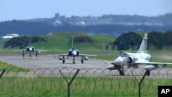 Taiwan Air Force Mirage fighter jets taxi on a runway at an airbase in Hsinchu, Taiwan, Aug. 5, 2022.