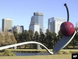 FILE - "Spoonbridge and Cherry," a sculpture by Claes Oldenburg, is seen in Minneapolis, Minnesota, Oct 29, 2002.