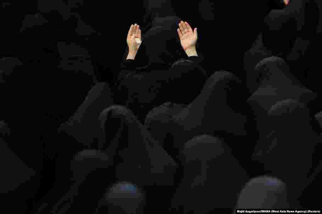 Iranian Shi&#39;ite Muslim women take part in a mourning event ahead of Ashura, the holiest day on the Shi&#39;ite Muslim calendar in Tehran, Aug. 7, 2022.