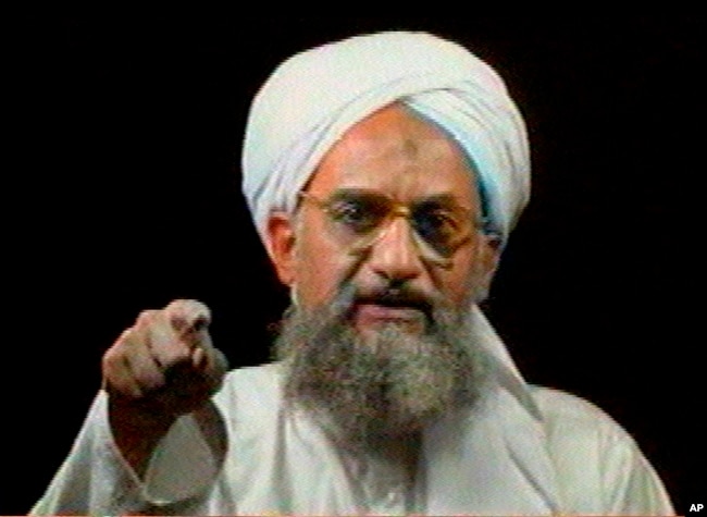 In this file image from television transmitted by the Arab news channel Al-Jazeera on Jan. 30, 2006, al-Qaida's then deputy leader Ayman al-Zawahri gestures while addressing the camera. (AP Photo/Al-Jazeera, File)