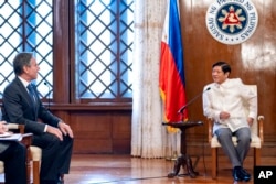 Secretary of State Antony Blinken, left, meets with Philippine President Ferdinand Marcos Jr. at the Malacanang Palace in Manila, Philippians, Aug. 6, 2022.