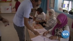 Tunisians Vote on Controversial New Constitution 