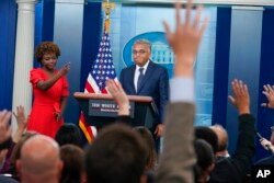 White House press secretary Karine Jean-Pierre calls on reporters for questions as White House Covid Response Coordinator Ashish Jha speaks about President Joe Biden's positive COVID-19 test during a briefing at the White House, July 21, 2022.