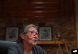 Rose Pipestem, a survivor of the Ermineskin residential school, sits for an interview, July 19, 2022, in Maskwacis, Alberta. Pipestem was placed in the residential school at 3 years old after her mother died.