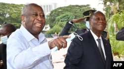 Laurent Gbagbo et son successeur et rival le président ivoirien Alassane Ouattara.