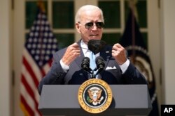 President Joe Biden arrives to speak in the Rose Garden of the White House in Washington, Wednesday, July 27, 2022. (AP Photo/Andrew Harnik)