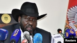 FILE - South Sudan's President Salva Kiir addresses a news conference at the State House in Juba, South Sudan, March 28, 2022.