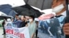 Members of North Korean human rights stage a rally to denounce South Korea's deportation of two North Korean fishermen in 2019, in front of the National Assembly in Seoul, South Korea, July 13, 2022.