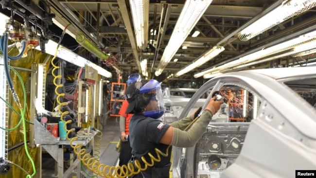 FILE -- The decline of good-paying factory jobs is contributing to record levels of stress and unhappiness, according to a Gallup research scientist.