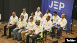 Doce integrantes del Ejército de Colombia reconocieron, en audiencia pública organizada por la Jurisdicción Especial para la Paz (JEP), su responsabilidad en crímenes de guerra y de lesa humanidad. [Foto: Twitter JEP]