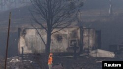 Пострадавший от пожара район города Ирека на севере Калифорнии, 1 августа 2022 года