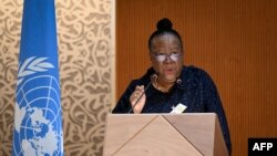 FILE - South African Minister of International Relations and Cooperation Naledi Pandor delivers a speech in Geneva, Feb. 28, 2022.