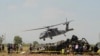 El personal de emergencia trabaja junto a un helicóptero Blackhawk de la Marina que se estrelló después de apoyar a quienes llevaron a cabo la captura del narcotraficante Rafael Caro Quintero, cerca de Los Mochis, estado de Sinaloa, México, el viernes 15 de julio de 2022.