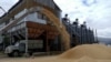 FILE - A truck is seen at a grain terminal during barley harvesting in Ukraine's Odesa region, June 23, 2022, as Russia's attack on its neighbor continues.