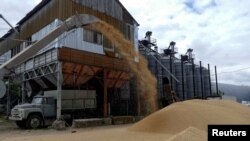 FILE - A truck is seen at a grain terminal during barley harvesting in Ukraine's Odesa region, June 23, 2022, as Russia's attack on its neighbor continues.