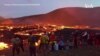 People Gather to Watch Icelandic Volcano Lava Show