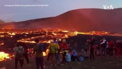 People Gather to Watch Icelandic Volcano Lava Show