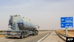 FILE: A fuel tanker truck drives along the international highway linking Tunisia's southern town of Ben Guerdane to Libya. Taken 6.4.2021
