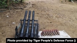 This photo provided by the Tiger People's Defense Force shows some of the homemade weapons the group is using.