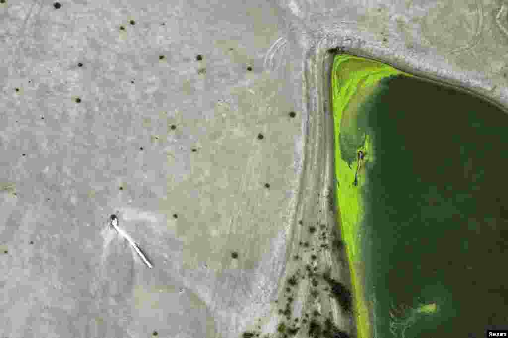 The dried-up River Po that has been suffering from the worst drought in 70 years is seen near Borgo Virgilio, Italy.