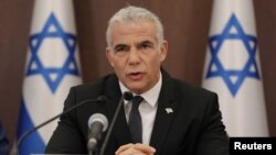 Israeli Prime Minister Yair Lapid attends a cabinet meeting at the prime minster’s office in Jerusalem, July 17, 2022.