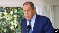 Russian Foreign Minister Sergey Lavrov speaks during a news conference with Ugandan President Yowerei Museveni (not pictured) in Entebbe, Uganda, 7.26.2022