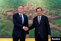 FILE - U.S. Secretary of State Antony Blinken meets with Cambodian Prime Minister Hun Sen, at the Peace Palace in Phnom Penh, Cambodia, Aug. 4, 2022.