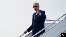 President Joe Biden arrives at King Abdulaziz International Airport, July 15, 2022, in Jeddah, Saudi Arabia.