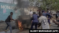 FILE: Protesters set fire in front of United Nations Mission for the Stabilisation of Congo (MONUSCO) Headquarters in Goma. Taken 7.25.2022