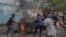 FILE: Protesters set fire in front of United Nations Mission for the Stabilisation of Congo (MONUSCO) Headquarters in Goma. Taken 7.25.2022