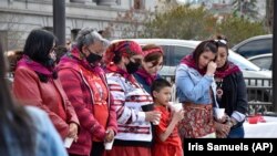 Family members of missing and murdered Indigenous women participate in a "wiping away of tears" ceremony in Helena, Montana, May 5, 2021.