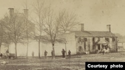 This 1861 photo shows the north side of the slave quarters after it was taken over by Union soldiers. (National Archives)