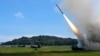 In this photo released by China's Xinhua News Agency, a projectile is launched from an unspecified location in China during long-range live-fire drills by the army of the Eastern Theater Command of the Chinese People's Liberation Army, Thursday, Aug. 4, 2022.