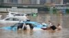 Belasan Tewas Akibat Banjir dan Gelombang Panas di China