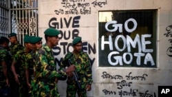 Sri Lanka army soldiers patrol near the official residence of president Gotabaya Rajapaksa three days after it was stormed by anti-government protesters in Colombo in Colombo, Sri Lanka, July 12, 2022. 