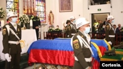 Ceremonia de los policías Diego Felipe Ruiz Rincón y James Antonio Morales Curico, en el Centro Religioso de la Policía Nacional en Bogotá. [Foto: Cortesía Policía Nacional]