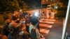 Members of the media wait outside the VIP complex exit of Changi International Airport anticipating the arrival of Sri Lanka's President Gotabaya Rajapaksa, his wife and two bodyguards, in Singapore, July 14, 2022.