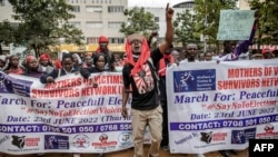FILE - Protesters chant slogans while marching during a protest to demand peaceful elections and justice for victims of post-election violence in Nairobi, Kenya on June 23, 2022.