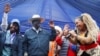 Kenya's opposition leader and presidential candidate Raila Odinga of the Azimio la Umoja (Declaration of Unity) coalition, joins performers at a campaign rally ahead of the forthcoming general election at the Kirigiti Stadium in Kiambu, Kenya, August 1, 2022.