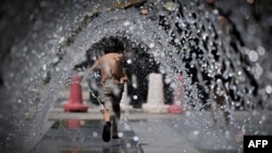 Fontana u parku Ćinećita kod Rima, 23. jul 2022. (Foto: AFP/Tiziana Fabi)