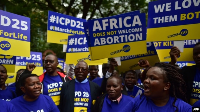 Kenyan anti-abortion activists and religious leaders demonstrate as they deliver over 68,000 signatures to the office of Kenyan President Uhuru Kenyatta to remove support for the International Conference on Population and Development (ICPD25), in Nairobi