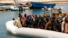 FILE - Migrants heading to Europe are brought back after being intercepted in the Mediterranean Sea by the Libyan coast guard, May 23, 2022. 